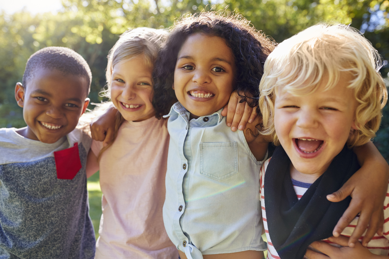 Group of smiling children together at the studio